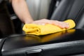 Car wash service, girl worker cleaning interior modern microfiber and console auto Royalty Free Stock Photo