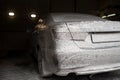 Car wash with soap. Royalty Free Stock Photo