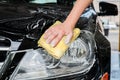 Car washing. Modern car covered by foam Royalty Free Stock Photo