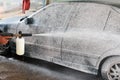 Car washing. Cleaning Car Using High Pressure Water