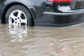 Car in water after heavy rain and flood Royalty Free Stock Photo