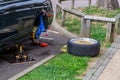 Car wheel arch rolling with reforming tool. Bending the arch to give more space between the inner tub and the inner arch Royalty Free Stock Photo