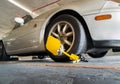 Car wheel blocked by wheel lock because illegal parking violation