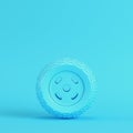 Car wheel on bright blue background in pastel colors. Minimalism concept Royalty Free Stock Photo