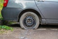 Car wheel flat tire on the road