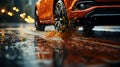 Car wheel with new tires during rain on a wet road Royalty Free Stock Photo