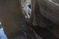 Car wheel stuck in mud close up Royalty Free Stock Photo