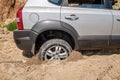 Car wheel stuck in the sand Royalty Free Stock Photo
