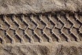 Car wheel tilres print footprint on the beach sand