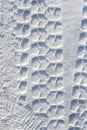 Car wheel tread print on snow Royalty Free Stock Photo
