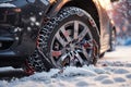 Car wheel with winter tire and snow chain in the snow. ai generative Royalty Free Stock Photo