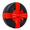 Car wheel wrapped ribbon and bow, gift concept. 3D rendering isolated on white background