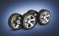 Car wheels with brake isolated on dark blue gradient background 3d