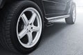 Car wheels close up on a background of asphalt. Car tires. Car wheel close-up Royalty Free Stock Photo