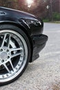 Car wheels close up on a background of asphalt. Car tires. Car wheel close-up. for advertising (for advertising) Royalty Free Stock Photo