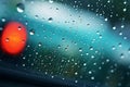 Car window adorned with raindrops, a visual symphony on rainy days