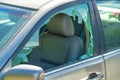 Car window broken on front left drivers side door with revealed saftey glass in the city downtown San Francisco California in Royalty Free Stock Photo