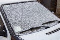 Car window covered with snow. After snowfall Royalty Free Stock Photo