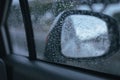 Car window with rain drops on glass or the windshield,Blurred traffic on rainy day Royalty Free Stock Photo