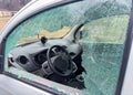 Car window smashed as a result of an act of vandalism Royalty Free Stock Photo