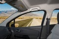 Car window with view of desert road, Death Valley, USA Royalty Free Stock Photo