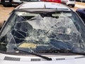 Car windshield broken by an accident