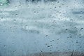Car windshield covered in raindrops/texture background