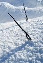 Car windshield wipers sticking out of snow