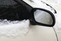 Car wing mirror with snow