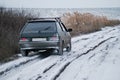 The car on a winter dirt road