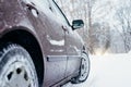 Car on winter road covered with snow Royalty Free Stock Photo