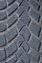 Car winter tire detail closeup, used car tires texture