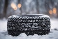 car winter wheel on icy winter snow