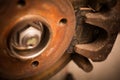 Car worn and rusty brake disk and caliper