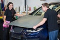 Car wrappers wrapping vehicle with vinyl film or foil