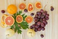 Cara orange and grape friut on the wooden table ,above view Royalty Free Stock Photo