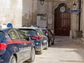 Carabinieri car in the foreground and in the background the police station of Monopoli Puglia-Italy