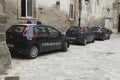 Carabinieri police cars on narrow street