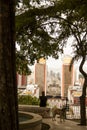 Caracas,Venezuela.Elderly woman contemplating the city of Caracas and its iconics twin towers, Las Torres del Silencio Royalty Free Stock Photo