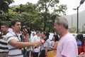 Anti Nicolas Maduro protesters is interviewed during a massive demonstration against the dictatorshi