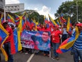 Supporters of Nicolas Maduro march in Caracas to commemorate the first anniversary of reelection