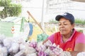 Caracas Venezuela 21/01/2012.Woman sells garlics in Street market in Guanabano Bridge in La Baralt Aveneu