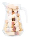 Carafe fill of wine corks isolated on white