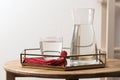 Carafe and glass with water on table indoors Royalty Free Stock Photo