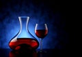 Carafe and Red Wine Glass with Textured Blue Background - 3D Illustration Royalty Free Stock Photo
