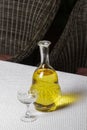 A carafe of white wine glass on the table Royalty Free Stock Photo