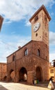 Palazzo della Credenza with the clock tower in Caramagna Piemonte Italy