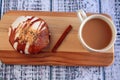 Caramel Apple doughnut and coffee Royalty Free Stock Photo