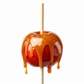 Caramel Apple with Dripping Golden Caramel Syrup Isolated on White Background Royalty Free Stock Photo