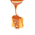 Caramel candies and caramel sauce pouring Royalty Free Stock Photo